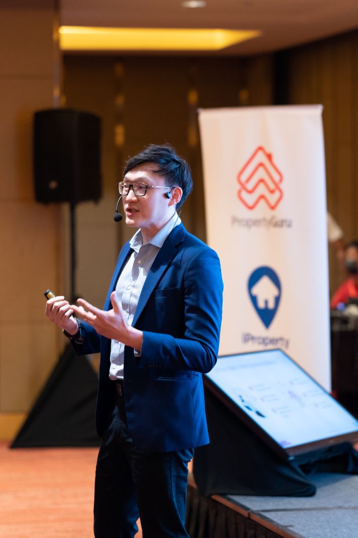 Alexander Ang Speaking in a conference